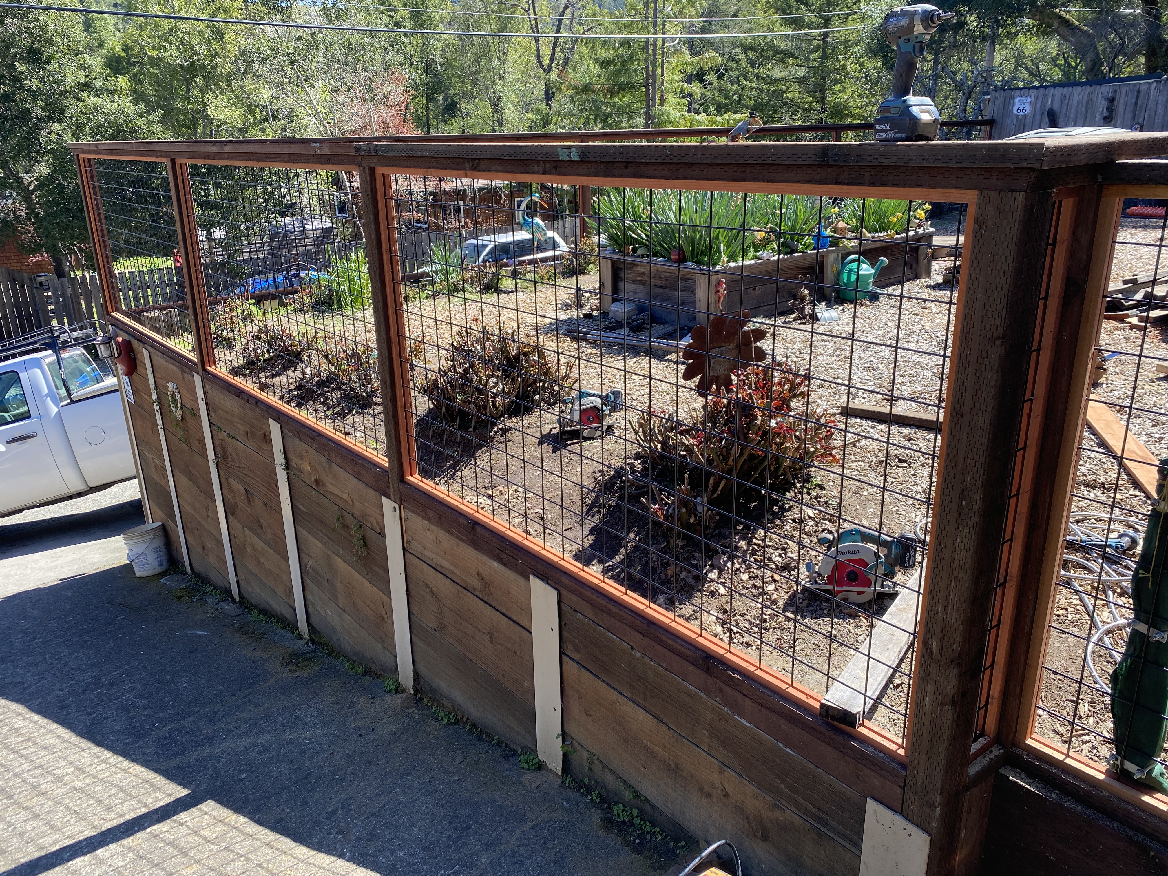 Hog wire fence with wood frame